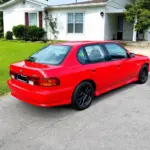 car parked in front of house