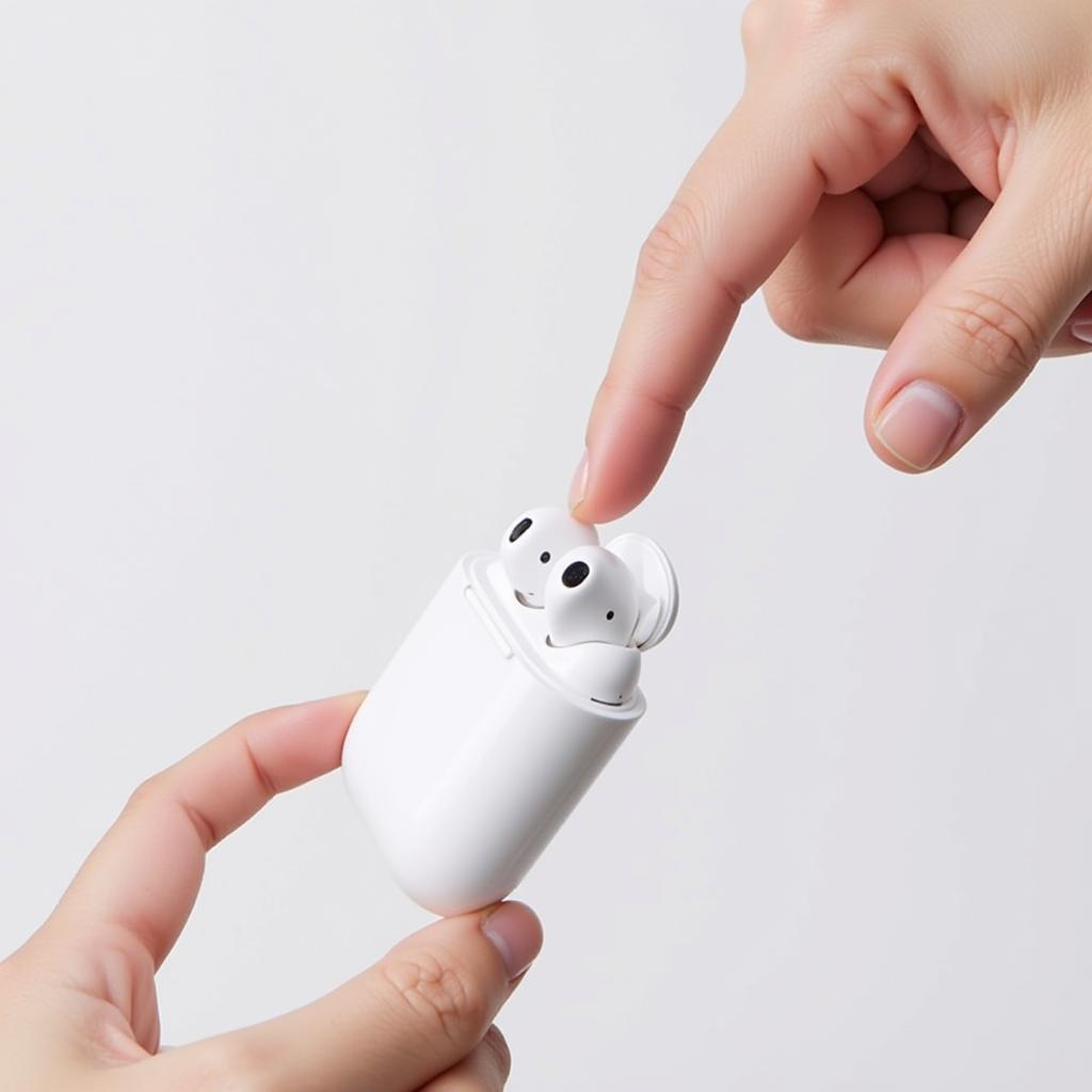 Điều khiển Airpods bằng cảm biến chạm